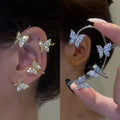 gold and silver butterfly cuff earrings clip-on with sparkling crystals on ears